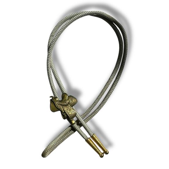 Vtg Bolo Tie Horse Saddle Metal Ends Nylon Cord Necklace Western Rodeo Cowboy - Picture 1 of 7